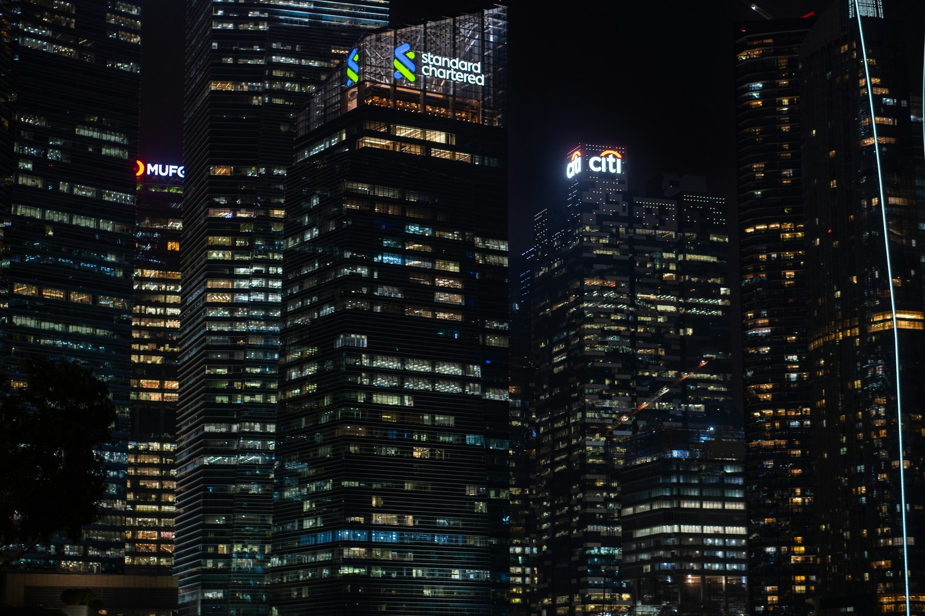Illuminated financial district at night